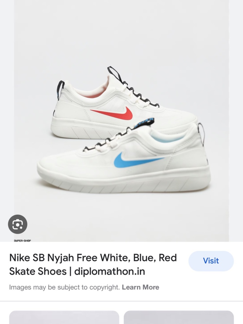 Nike White Sneakers with Blue Swoosh and Red Accent